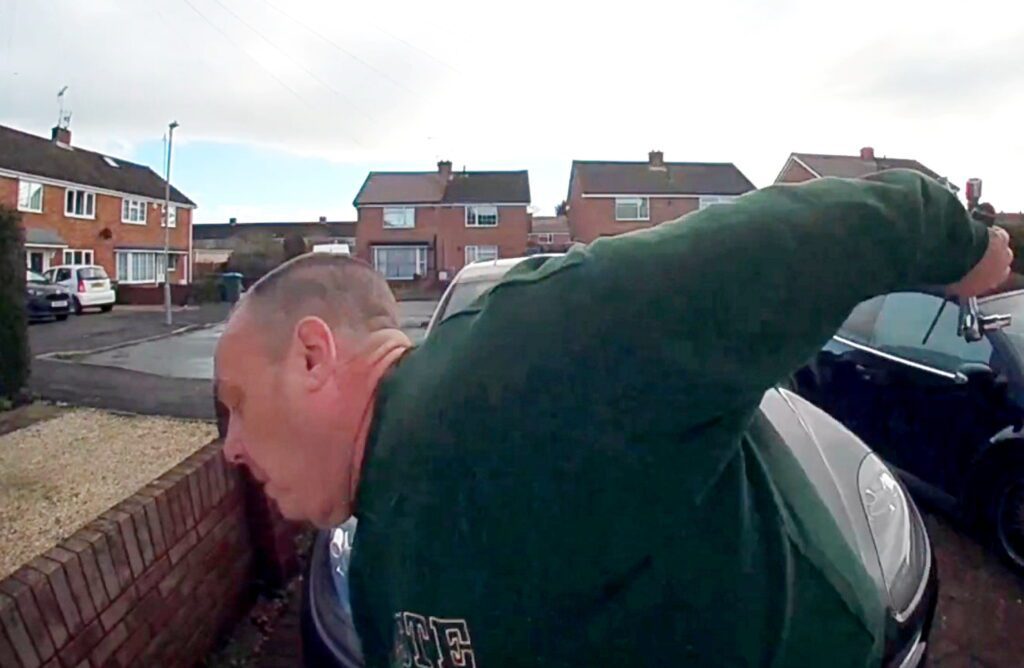 Dad caught on doorbell cam falling through garden wall - Discover SWNS